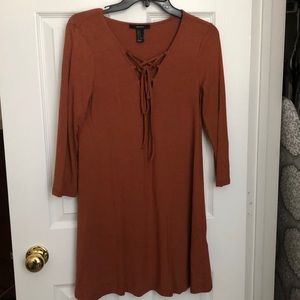 Rust colored lace-up dress